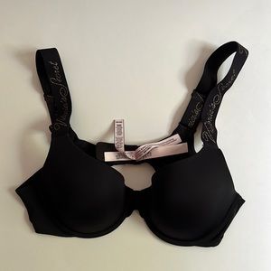 Black Victoria Secret Bra with gold glittered letters.         NEW WITHOUT TAGS